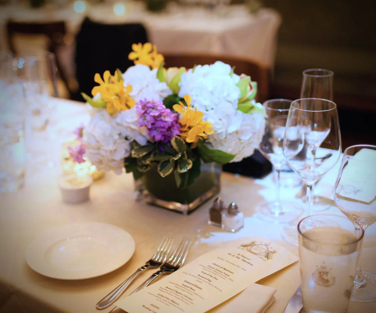 Floral arrangements prepared for a wedding reception in the Clubhouse main hall