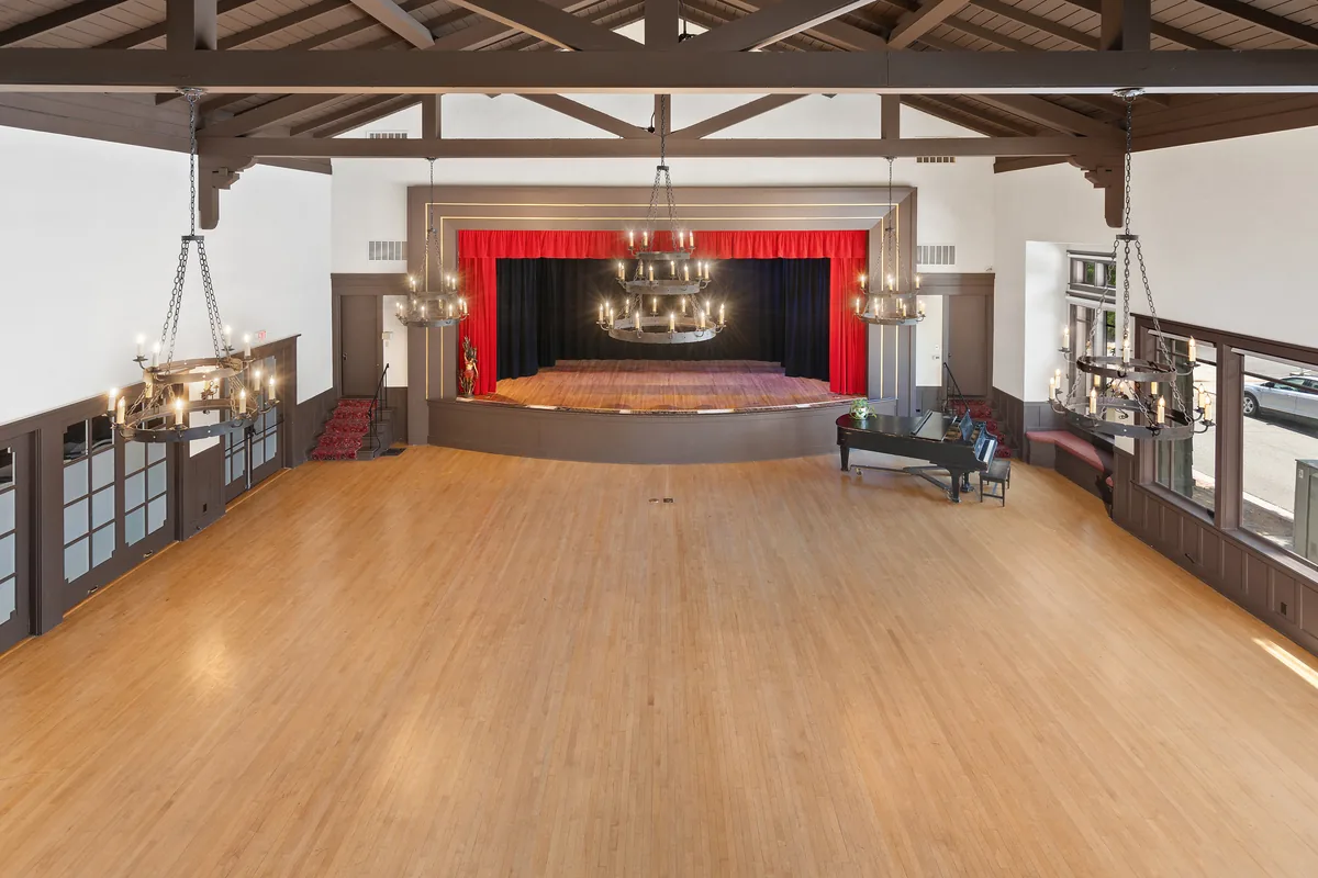 The Clubhouse stage and proscenium, used for presentations, ceremonies and recitals